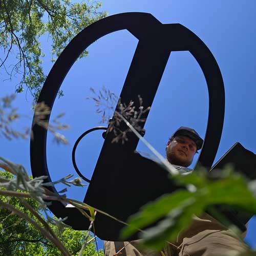 Treasure hunter with OKM eXp 7000 VLF metal detector